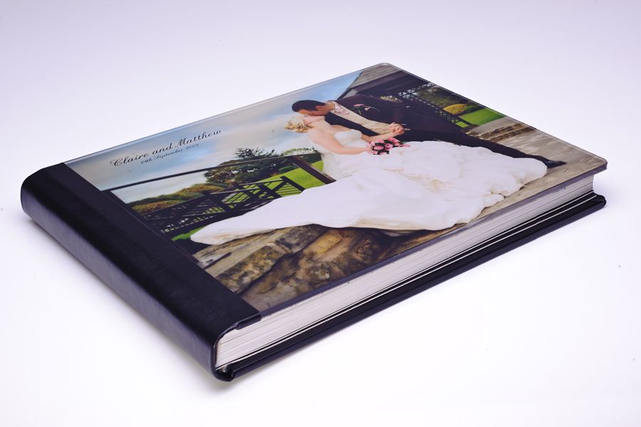 D3A_9231-copy | Weddings by Michael Wedding photo album with a bride and groom on the cover.
