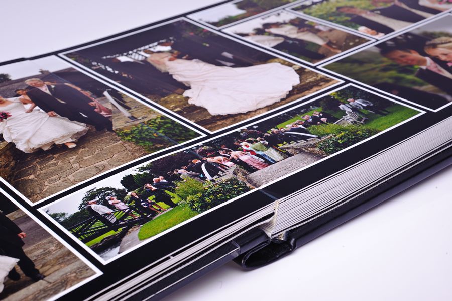 D3A_9235-copy | Weddings by Michael Open wedding photo album with a collage of wedding moments on glossy pages, showing guests and gowns on a grid of photos.